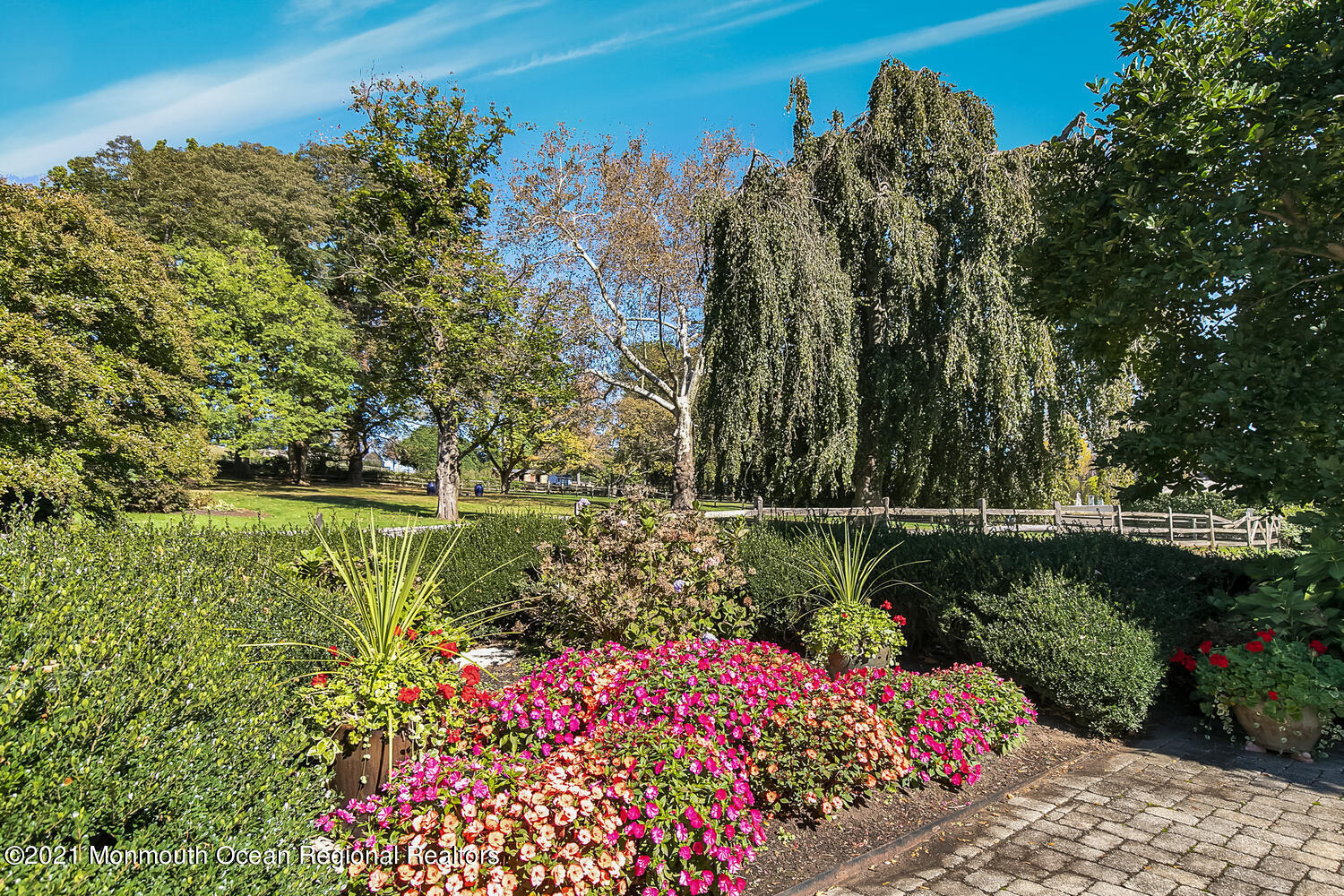 299 Cooper Road Middletown, NJ 07701 - Photo 24 of 27 a view of a lake with a house