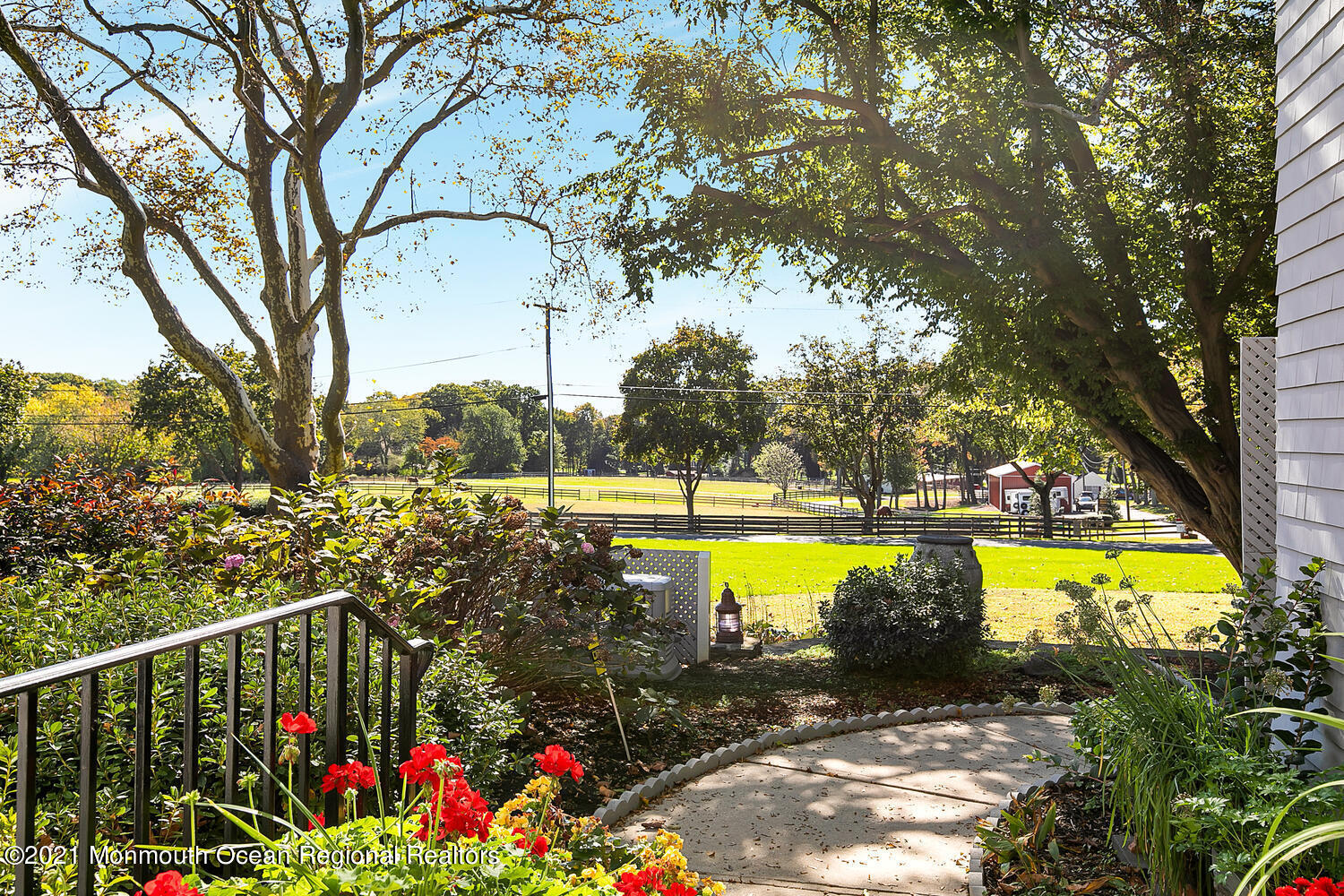 299 Cooper Road Middletown, NJ 07701 - Photo 25 of 27 a view of a swimming pool with a patio