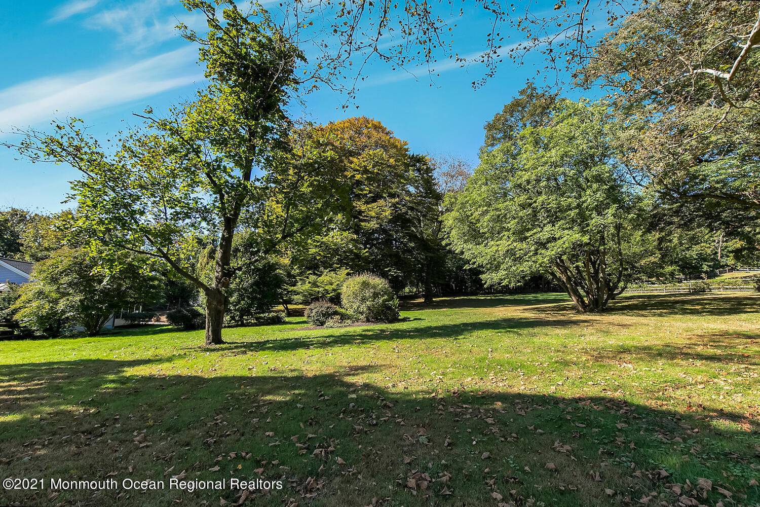 299 Cooper Road Middletown, NJ 07701 - Photo 26 of 27 a view of a park with large trees