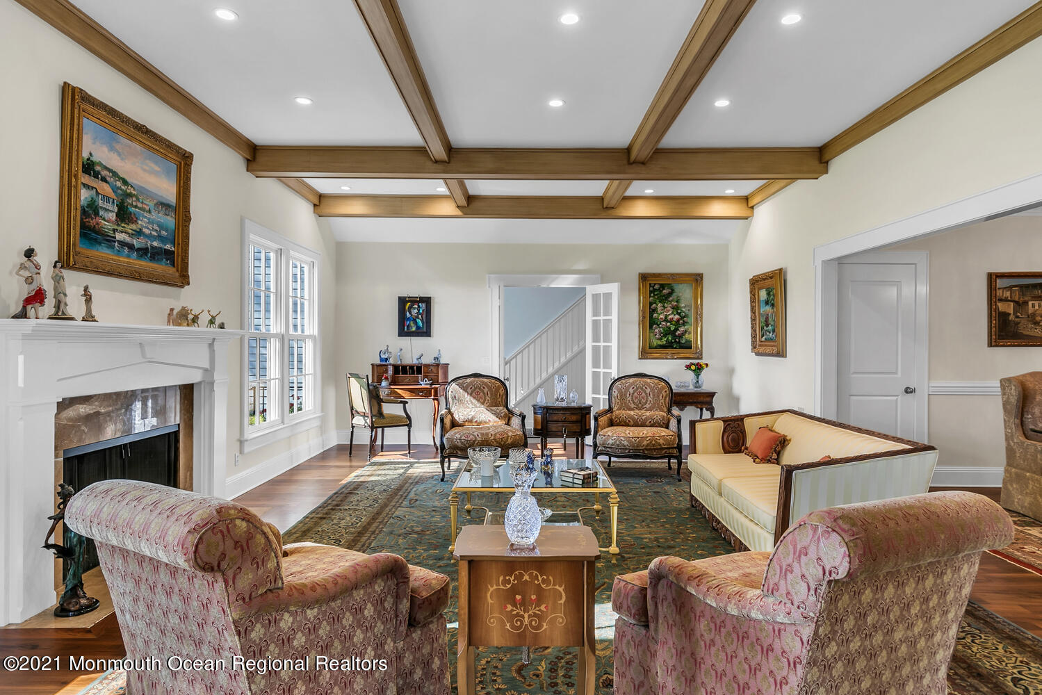 299 Cooper Road Middletown, NJ 07701 - Photo 5 of 27 a living room with furniture a fireplace and wooden floor