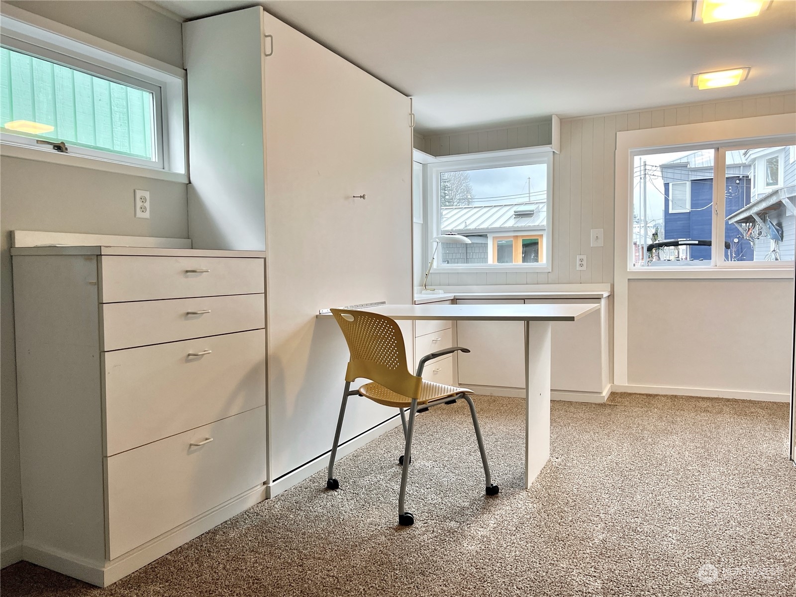 2219 Fairview Avenue East, Unit 11 Seattle, WA 98102 - Photo 12 of 15 a view of a chair and table in a room