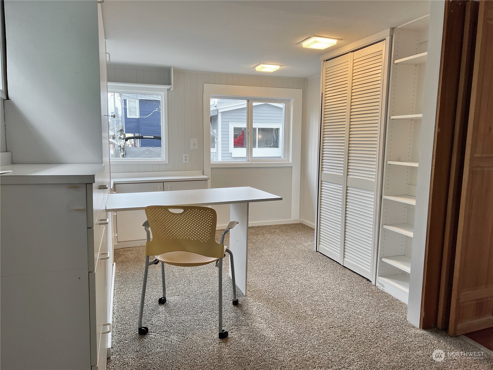 2219 Fairview Avenue East, Unit 11 Seattle, WA 98102 - Photo 13 of 15 a workspace with furniture and a window