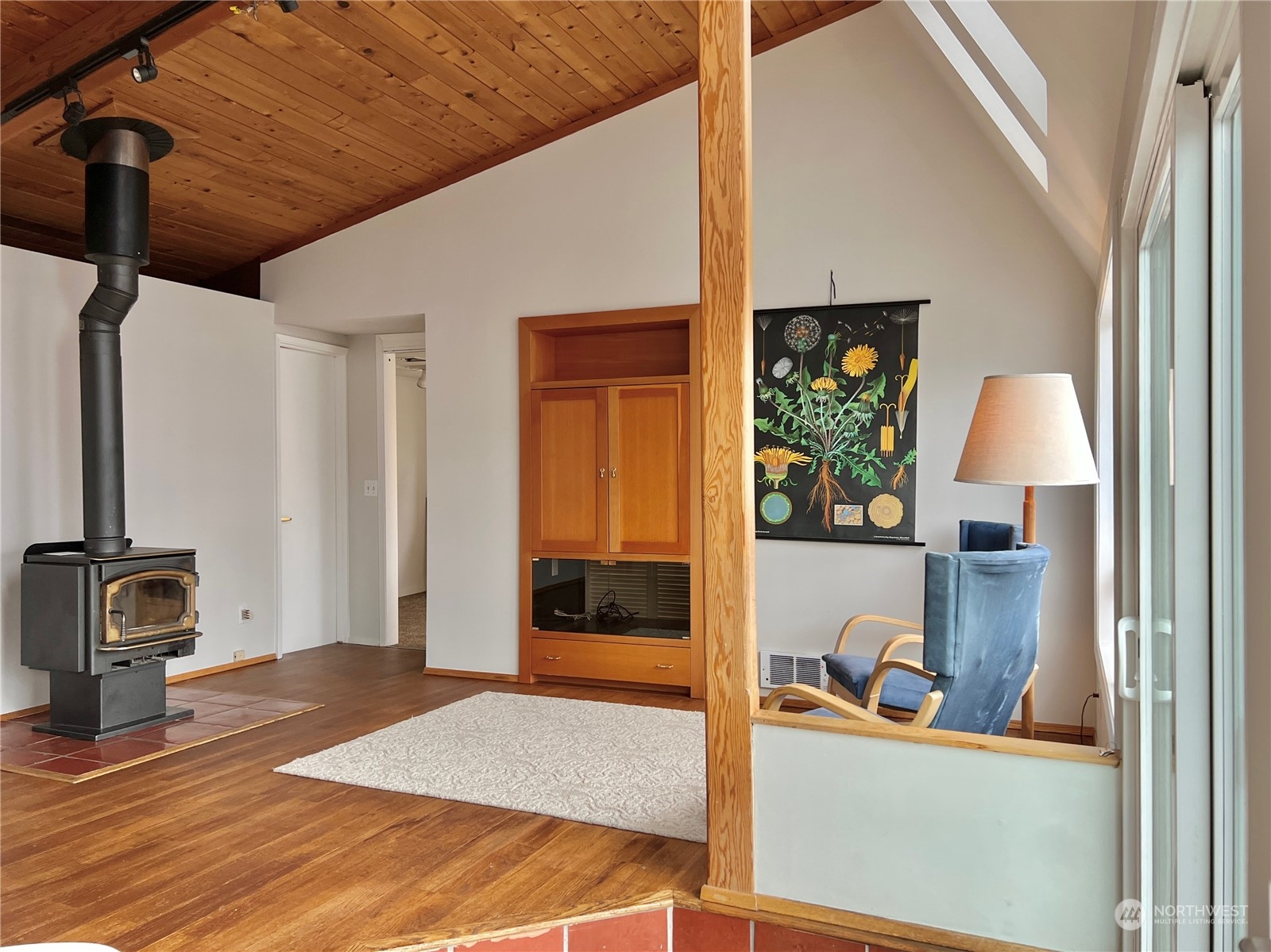2219 Fairview Avenue East, Unit 11 Seattle, WA 98102 - Photo 4 of 15 a living room with furniture and a window