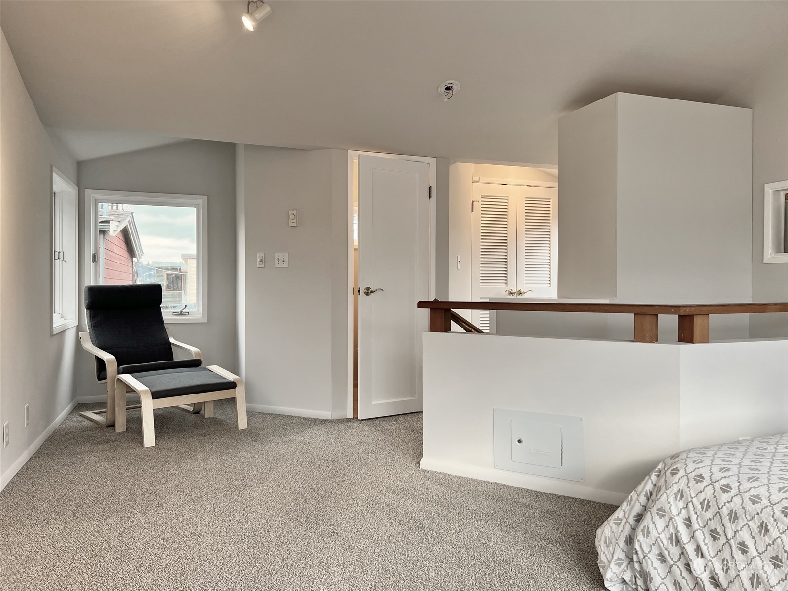 2219 Fairview Avenue East, Unit 11 Seattle, WA 98102 - Photo 8 of 15 a living room with furniture