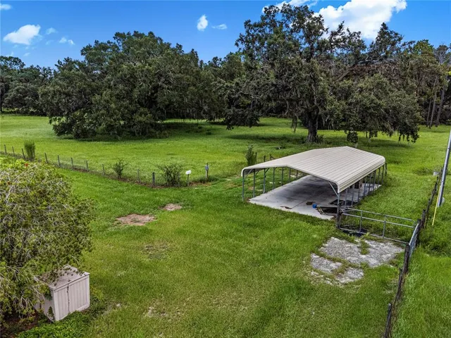 a house view with a garden space
