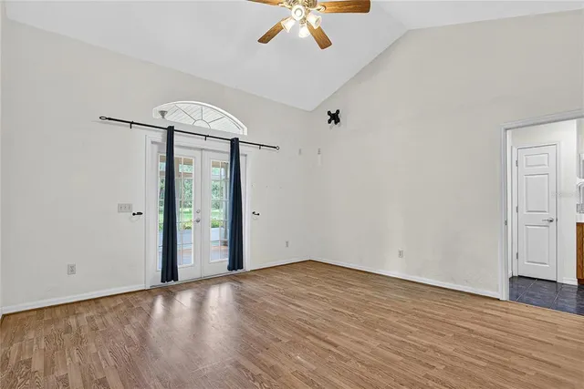 a bathroom with a granite countertop double vanity sink mirror and
