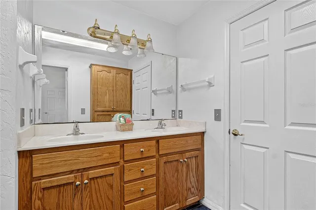 a kitchen with stainless steel appliances granite countertop a stove and cabinets
