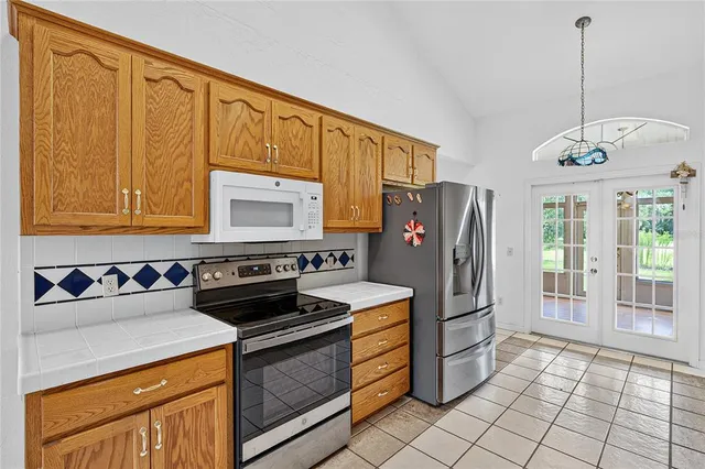 a view of a room with window and wooden floor