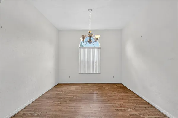 a bedroom with a bed and a fireplace