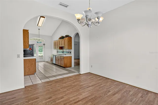 a view of a hallway view with staircase