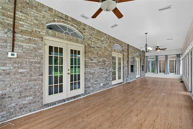 an empty room with windows