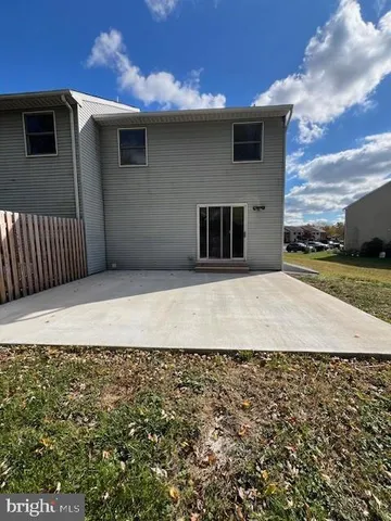 a view of a backyard of the house