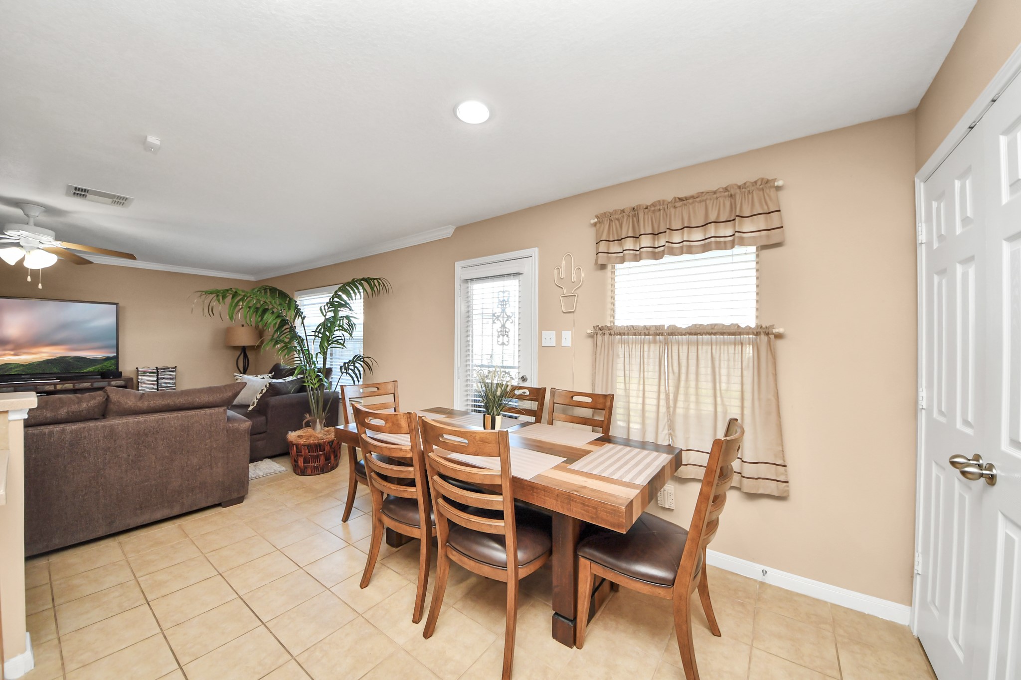 6902 Anson Point Lane Houston, TX 77040 - Photo 12 of 40 a dining room with furniture and windows