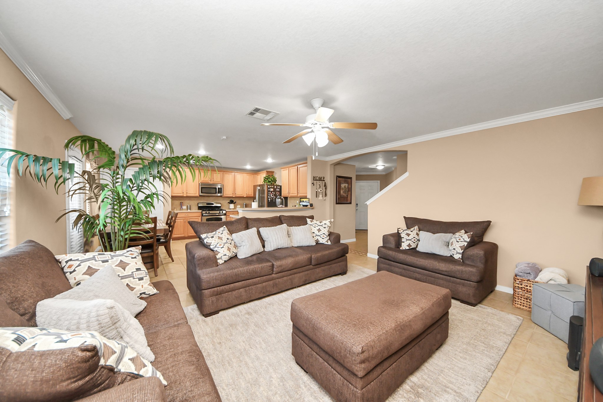 6902 Anson Point Lane Houston, TX 77040 - Photo 14 of 40 a living room with furniture and a chandelier