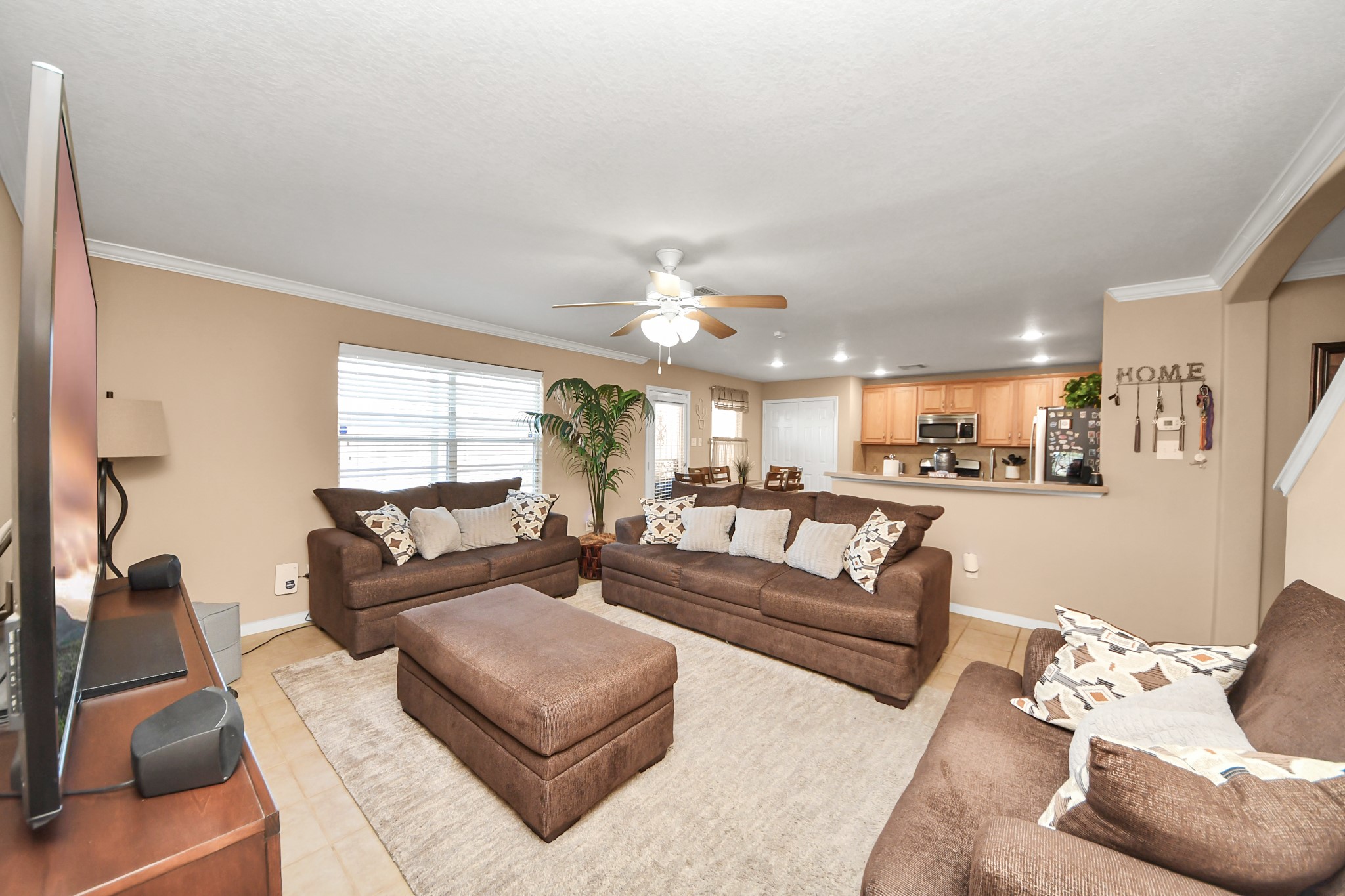 6902 Anson Point Lane Houston, TX 77040 - Photo 16 of 40 a living room with furniture and a large window