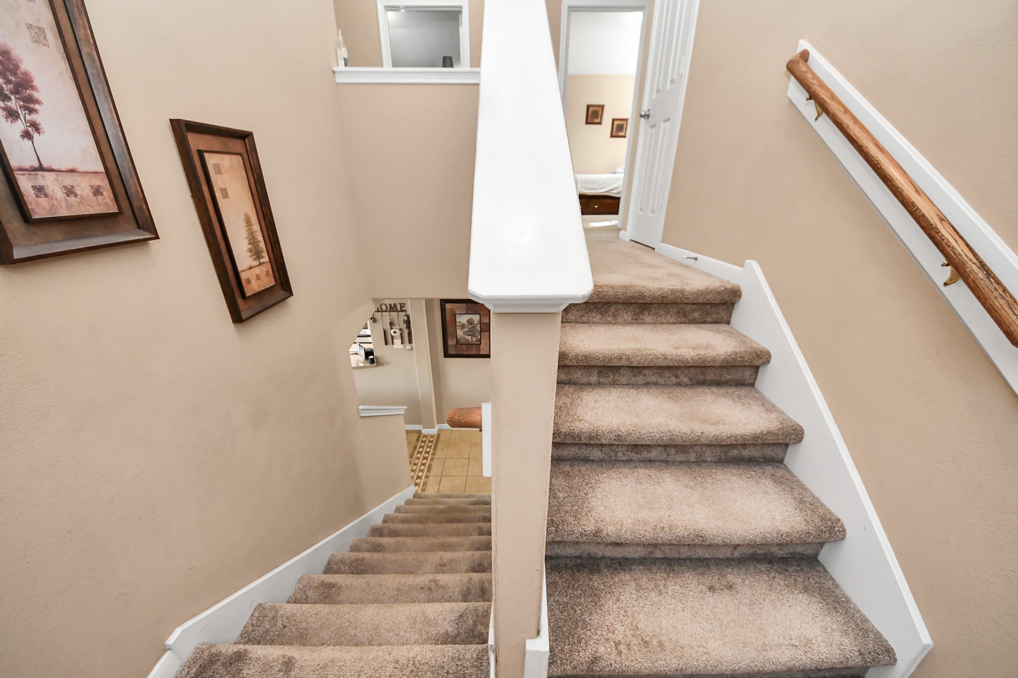 6902 Anson Point Lane Houston, TX 77040 - Photo 19 of 40 a view of staircase with white walls and white walls