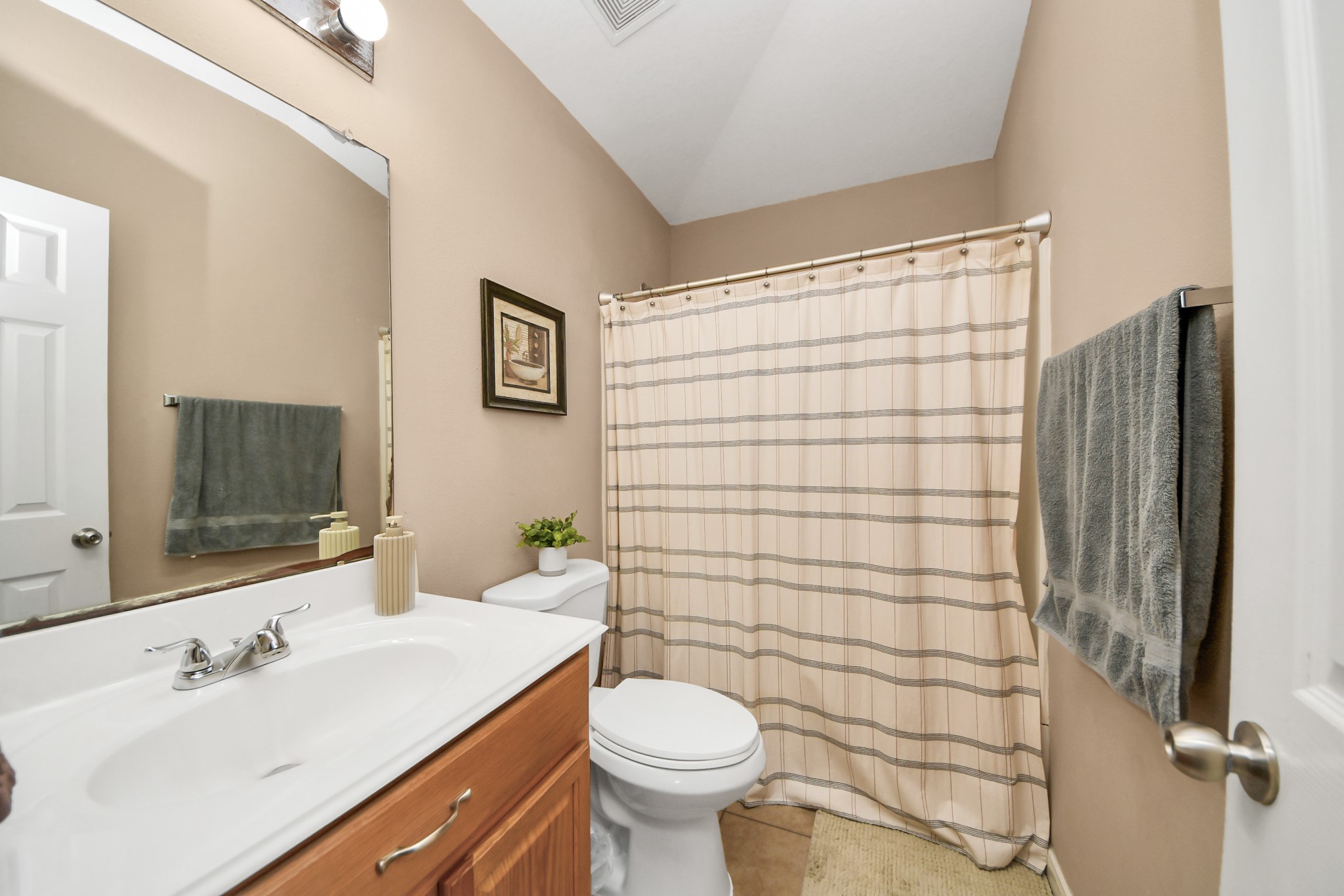 6902 Anson Point Lane Houston, TX 77040 - Photo 29 of 40 a bathroom with a sink toilet and shower