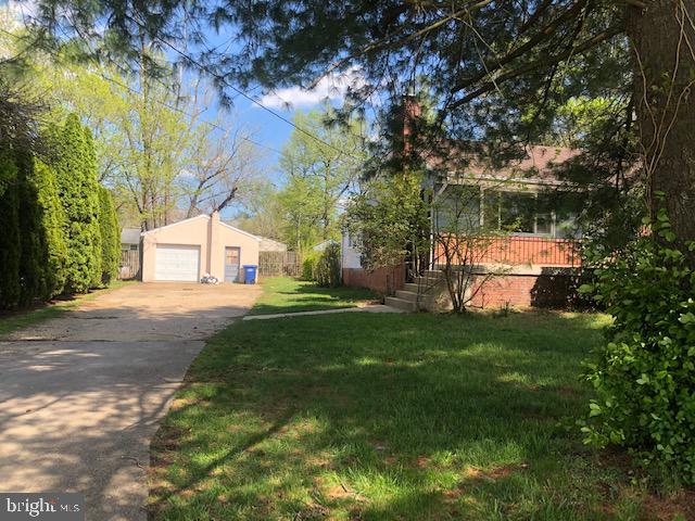 6007 Brookland Road Alexandria, VA 22310 - Photo 3 of 14 Front Exterior w/garage view