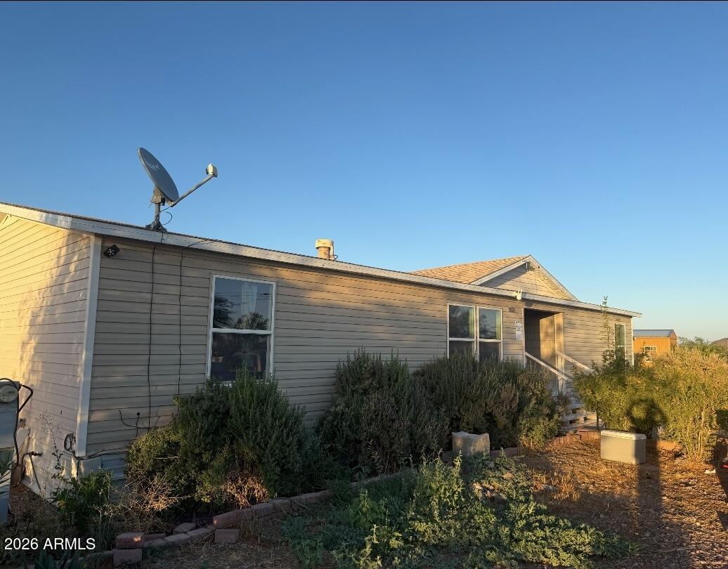 2625 Saddle Vista Road Tonopah, AZ 85354 - Photo 11 of 19 a view of a house with a yard