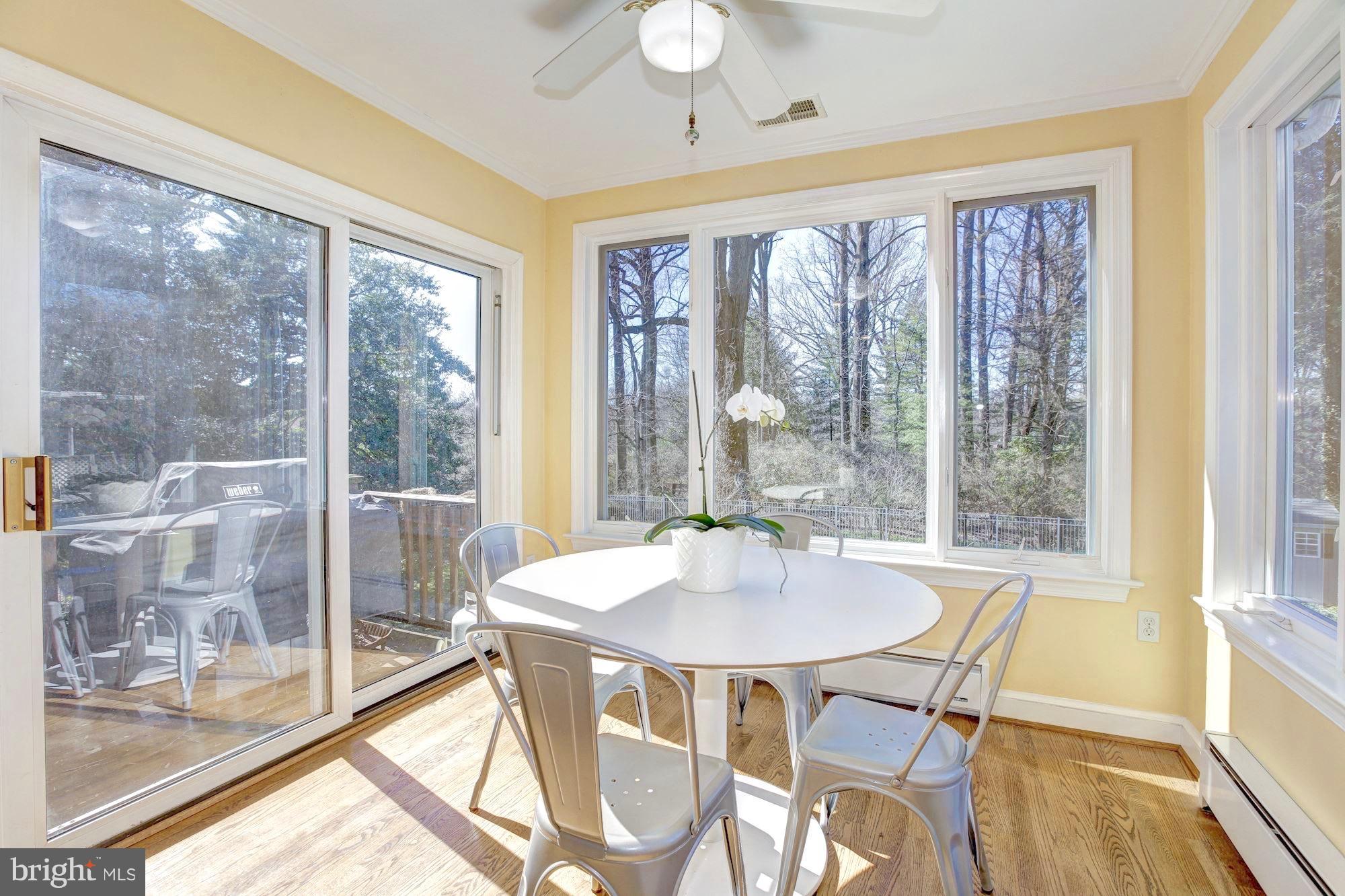 9904 Old Spring Road Kensington, MD 20895 - Photo 11 of 29 Eat-in kitchen space leads to deck.
