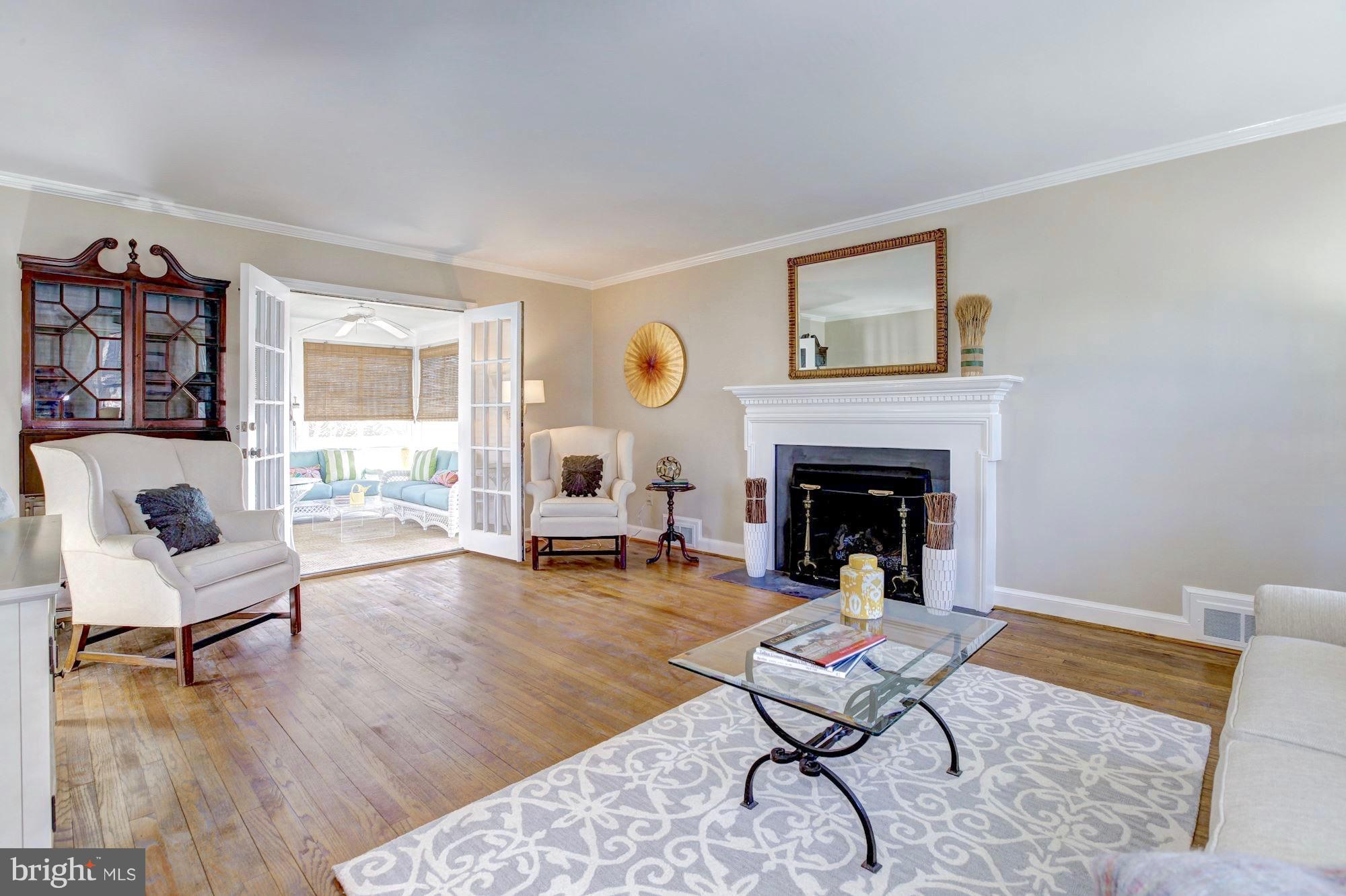 9904 Old Spring Road Kensington, MD 20895 - Photo 5 of 29 Living Room opens to sunny, screened porch.
