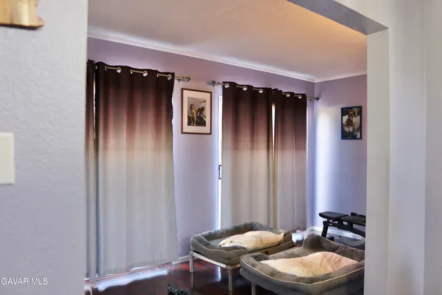 a view of a livingroom with furniture and window