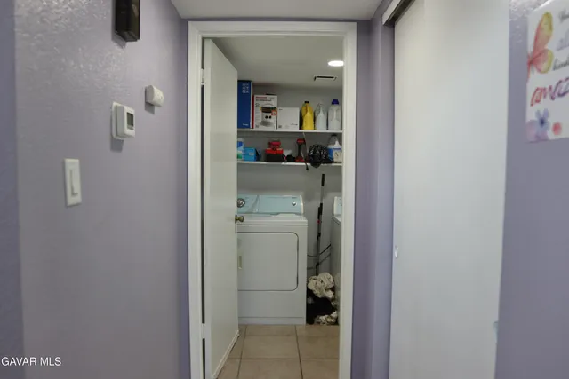 a room with a washer and dryer