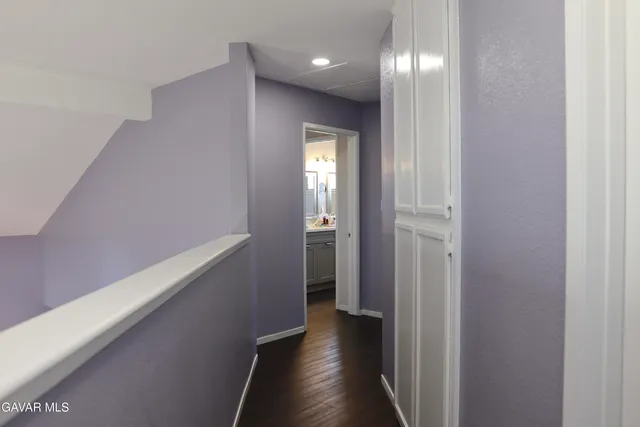 a view of hallway with stairs