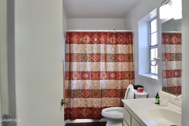 a bathroom with a sink and a toilet