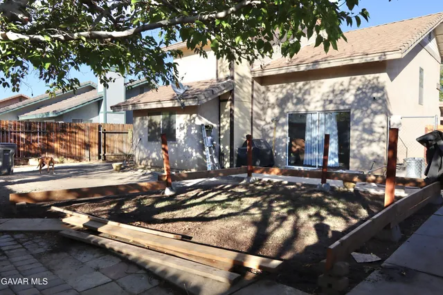 a view of street with large trees