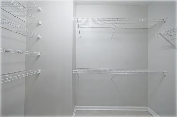 a view of a backyard with swimming pool