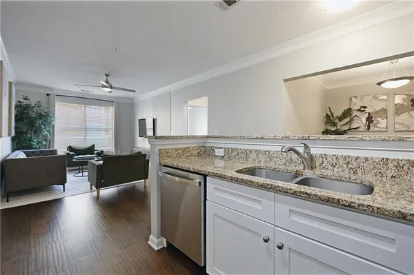 a room with gym equipment and large mirror