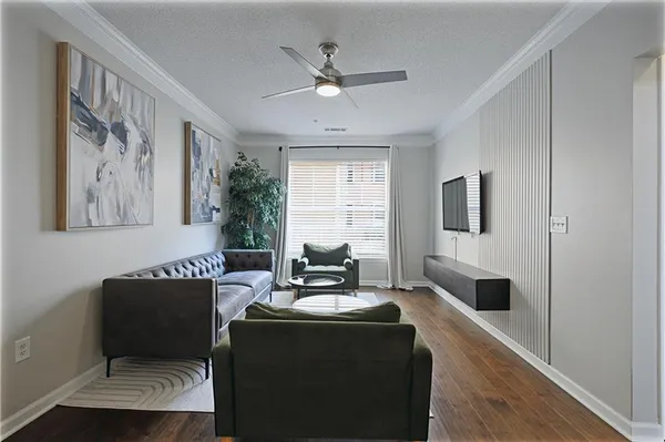 a view of a swimming pool and a back yard