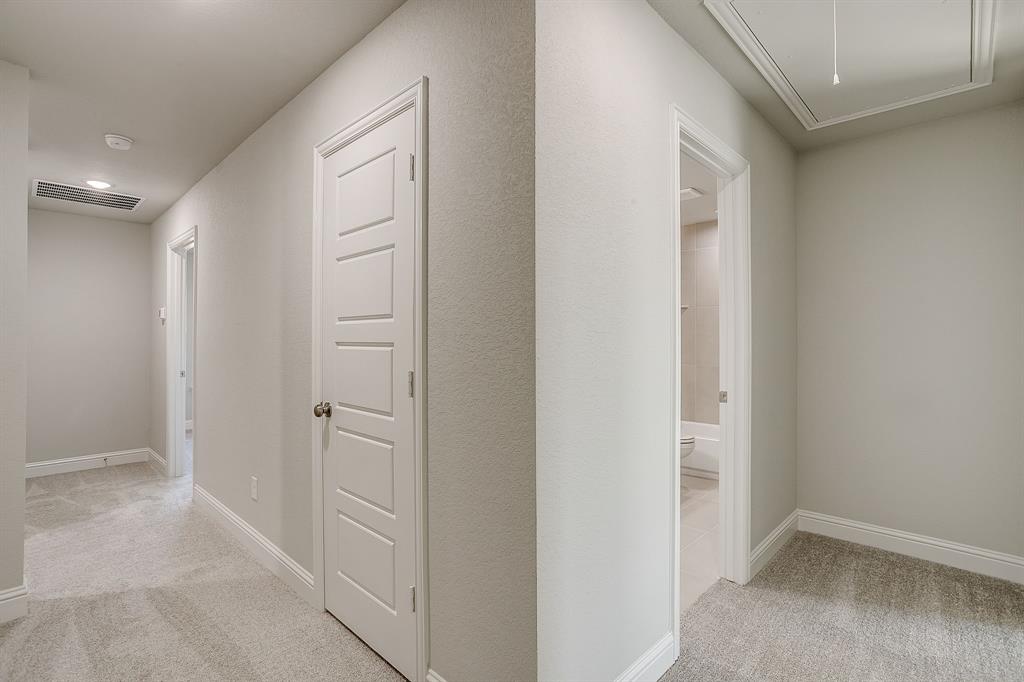 6817 Robert Reed Drive Arlington, TX 76001 - Photo 31 of 40 a view of a hallway with closet area