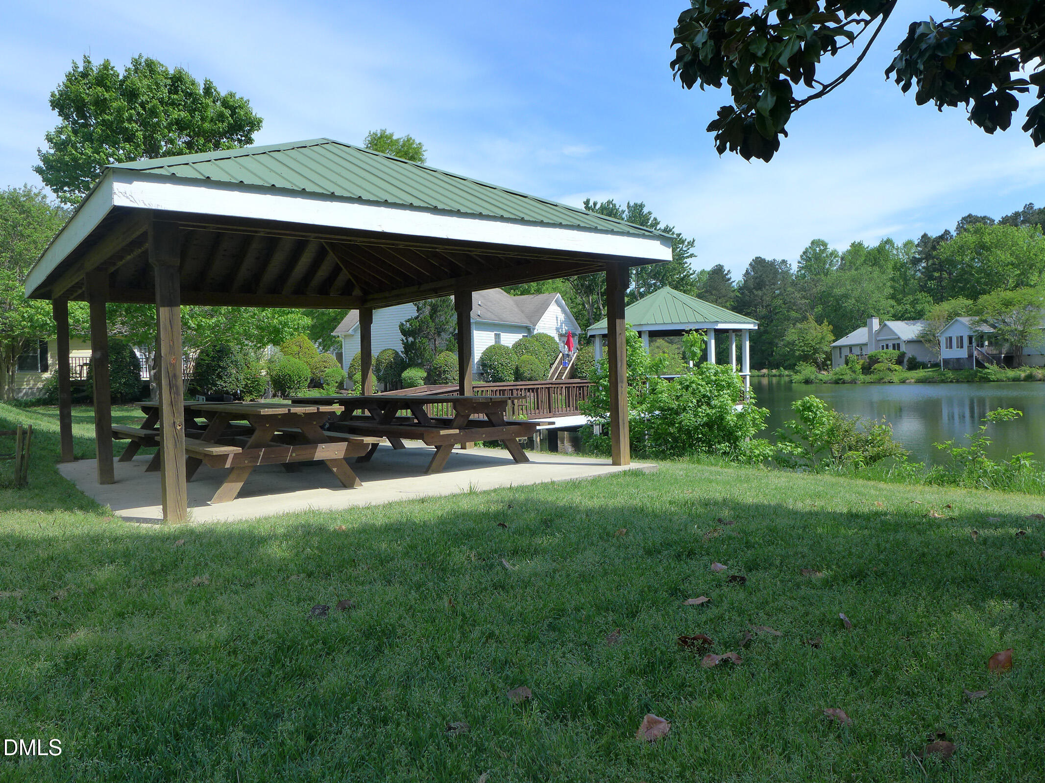 120 Weatherhill Point Carrboro, NC 27510 - Photo 23 of 25 a view of backyard with table and chairs under an umbrella