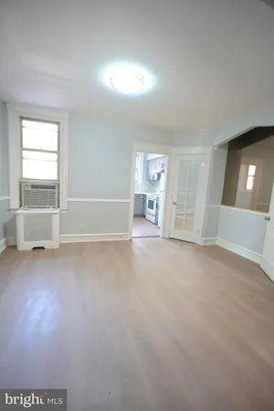 a view of livingroom with furniture and window