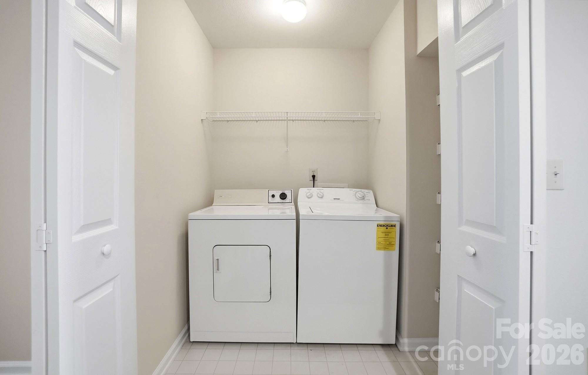 711 Stone Village Drive Fort Mill, SC 29708 - Photo 28 of 46 a utility room with dryer and washer