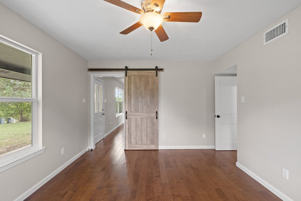 2206 Jacks Pass Austin, TX 78734 - Photo 13 of 35 a view of an empty room with a window