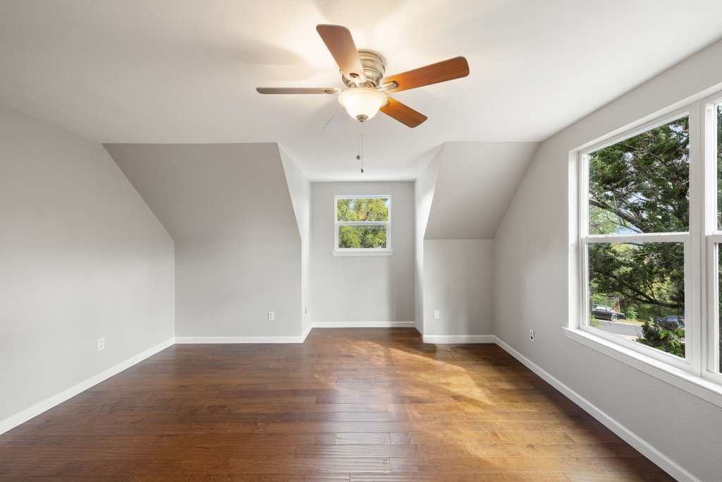 2206 Jacks Pass Austin, TX 78734 - Photo 20 of 35 a view of an empty room with a window