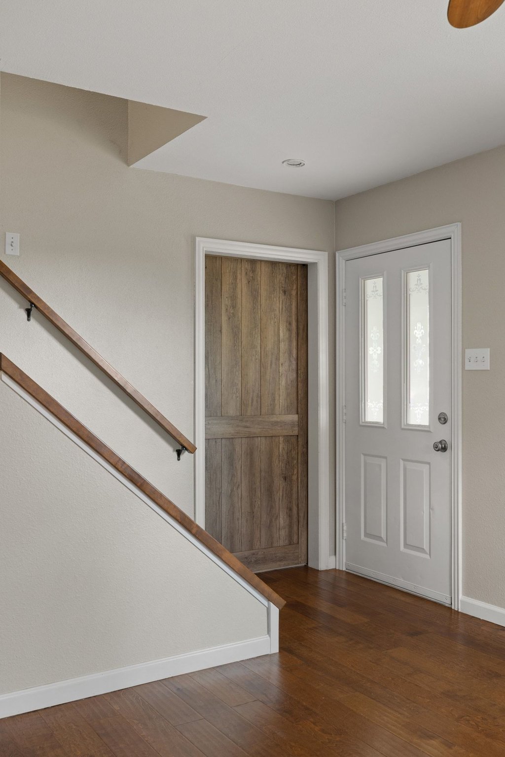 2206 Jacks Pass Austin, TX 78734 - Photo 2 of 35 a view of an empty room with wooden floor