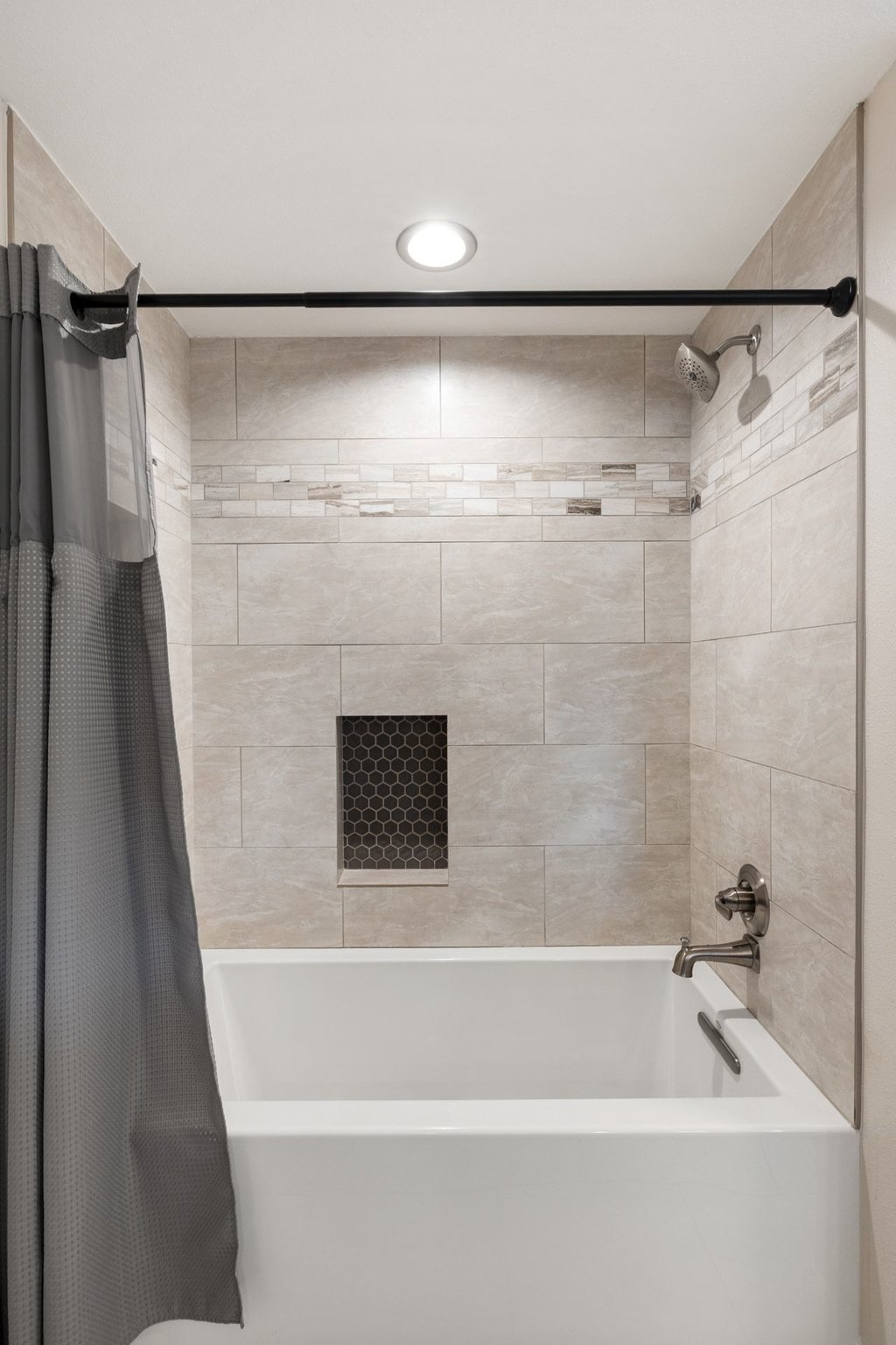 2206 Jacks Pass Austin, TX 78734 - Photo 25 of 35 a bathroom with a shower and a bath tub