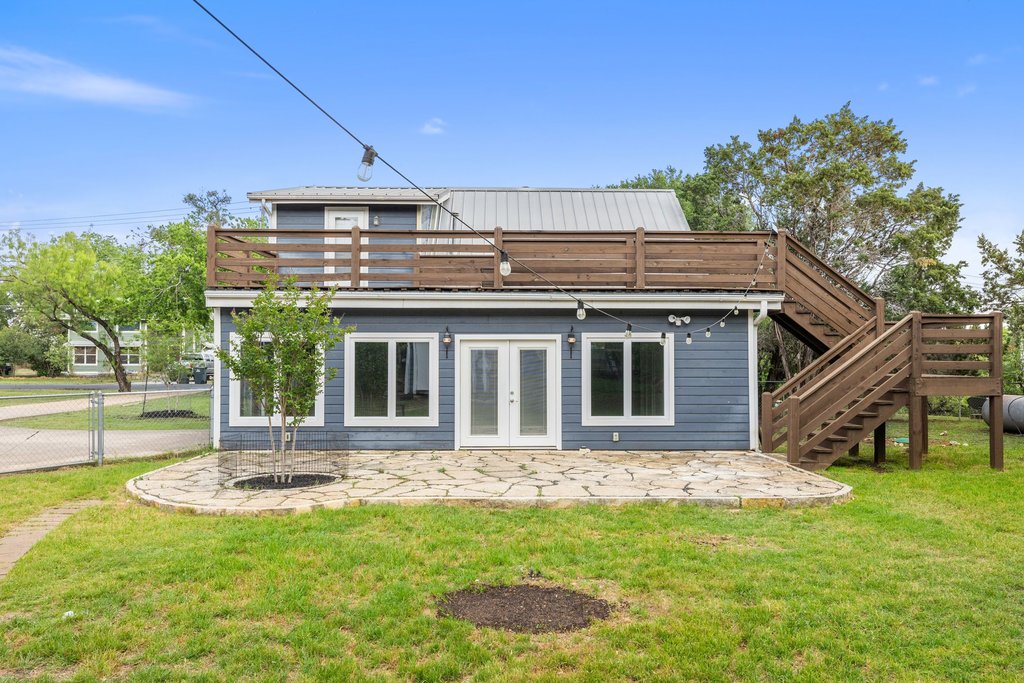 2206 Jacks Pass Austin, TX 78734 - Photo 27 of 35 a front view of a house with a yard
