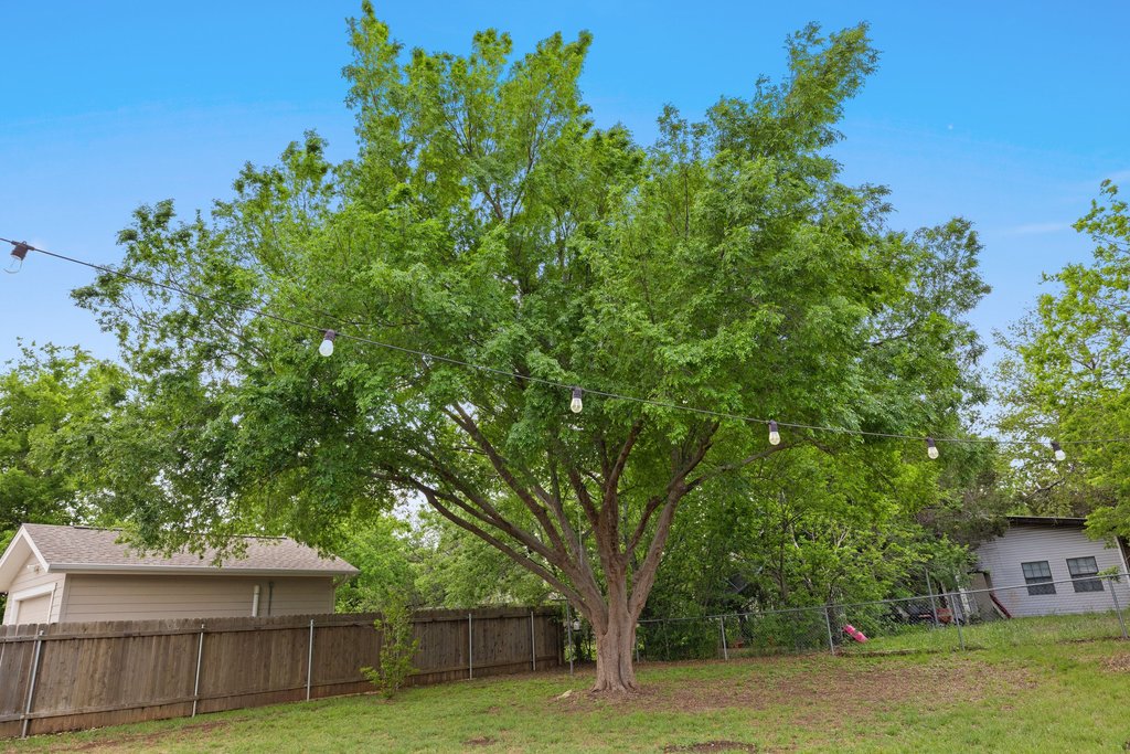 2206 Jacks Pass Austin, TX 78734 - Photo 30 of 35 a view of a house with a big yard