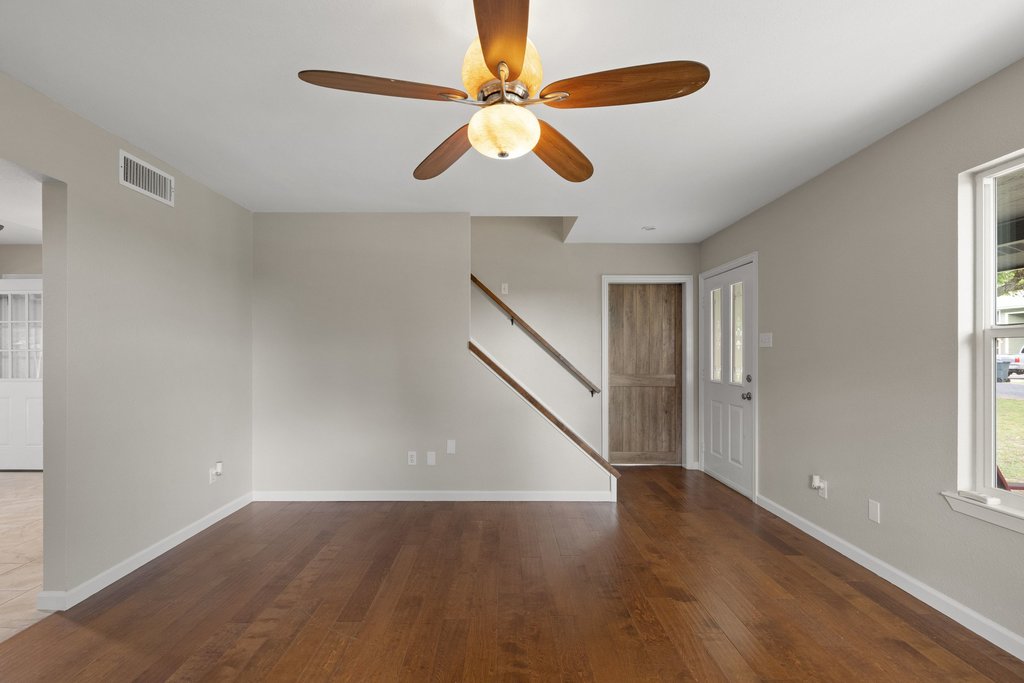 2206 Jacks Pass Austin, TX 78734 - Photo 3 of 35 wooden floor in an empty room with a window