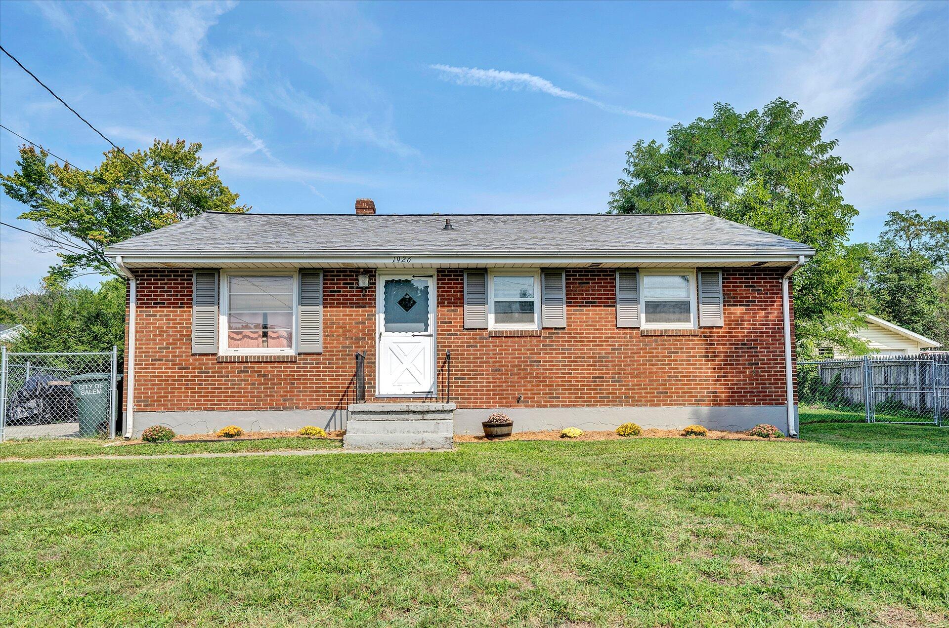 1926 Burma Road Salem, VA 24153 - Photo 1 of 16 a front view of a house with a yard