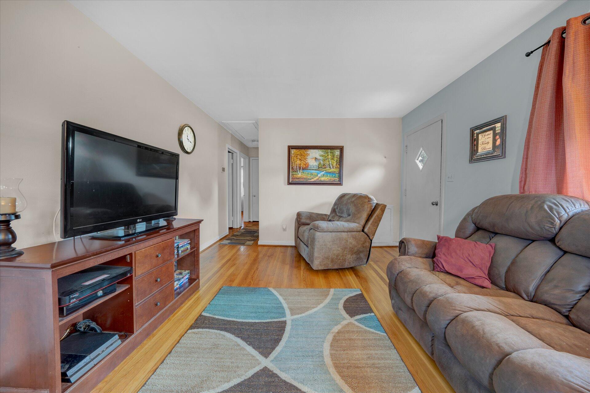 1926 Burma Road Salem, VA 24153 - Photo 3 of 16 a living room with furniture and a flat screen tv