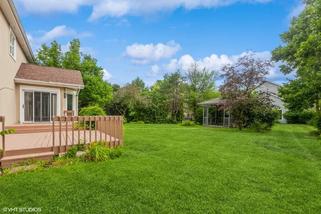 a view of a house with a back yard