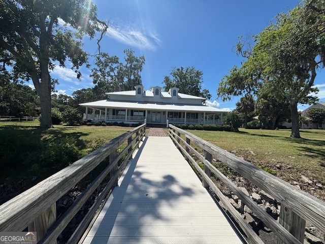 3 Bluff Creek Road Midway, GA 31320 - Photo 7 of 16 a view of a yard with an outdoor seating