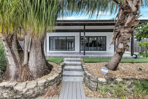 a view of an entryway with a garden
