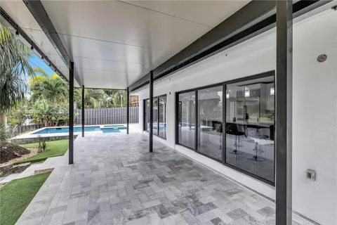 a view of a backyard with a car parked